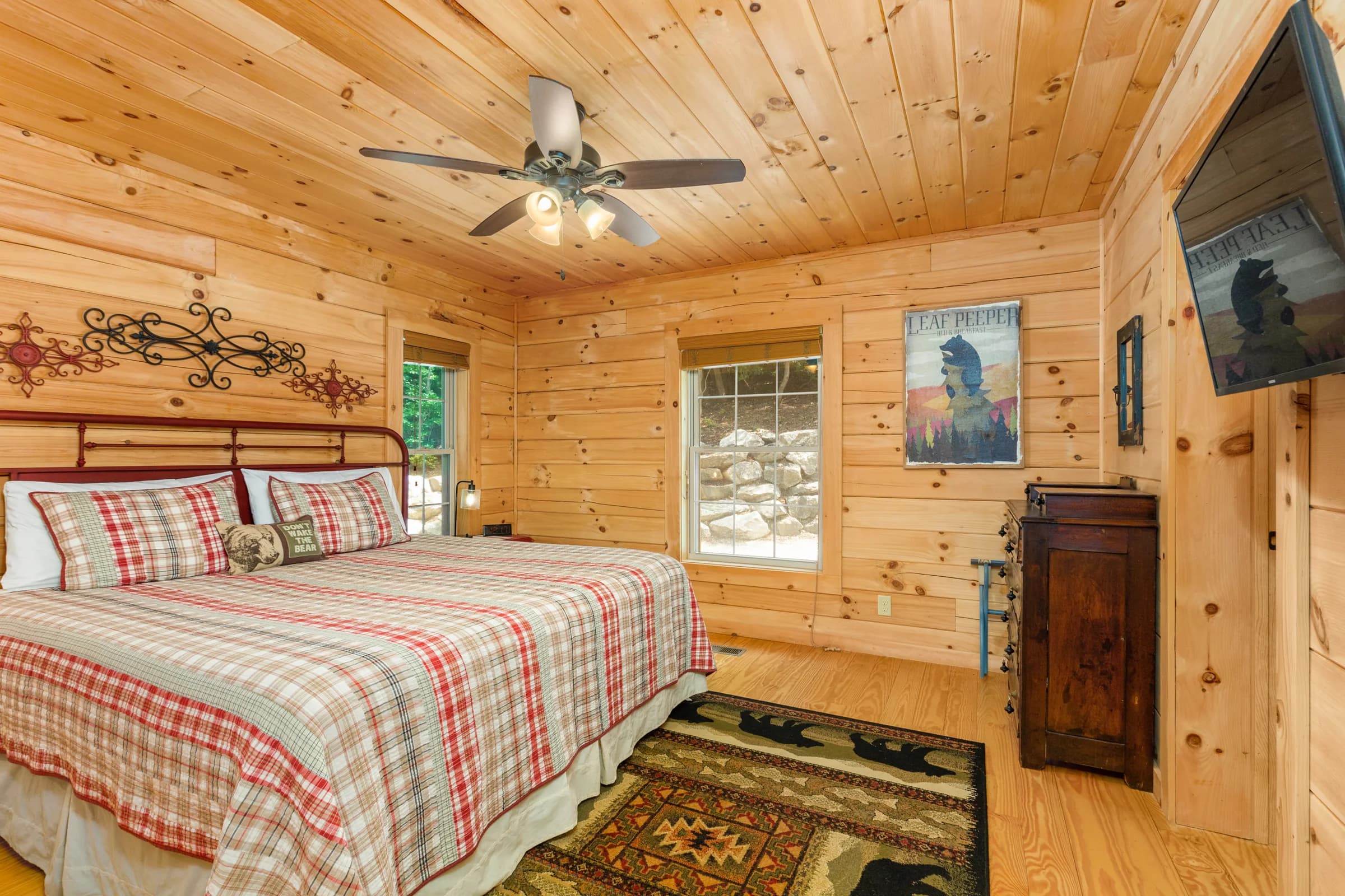 Whispering Trees Cabin main-level king bedroom