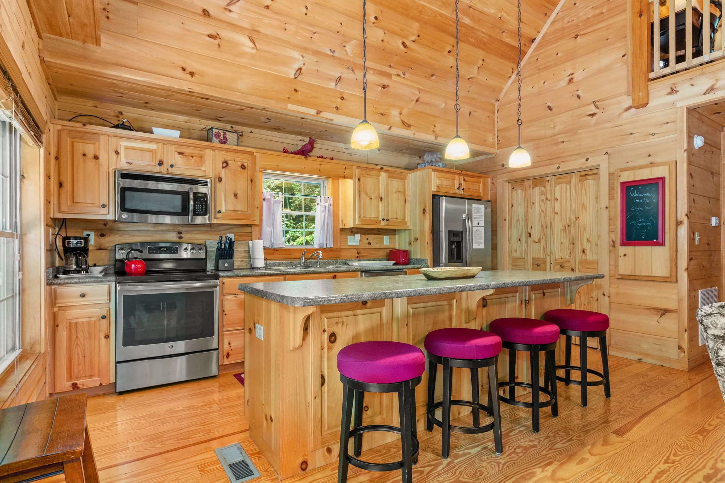 Whispering Trees Cabin kitchen with island seating