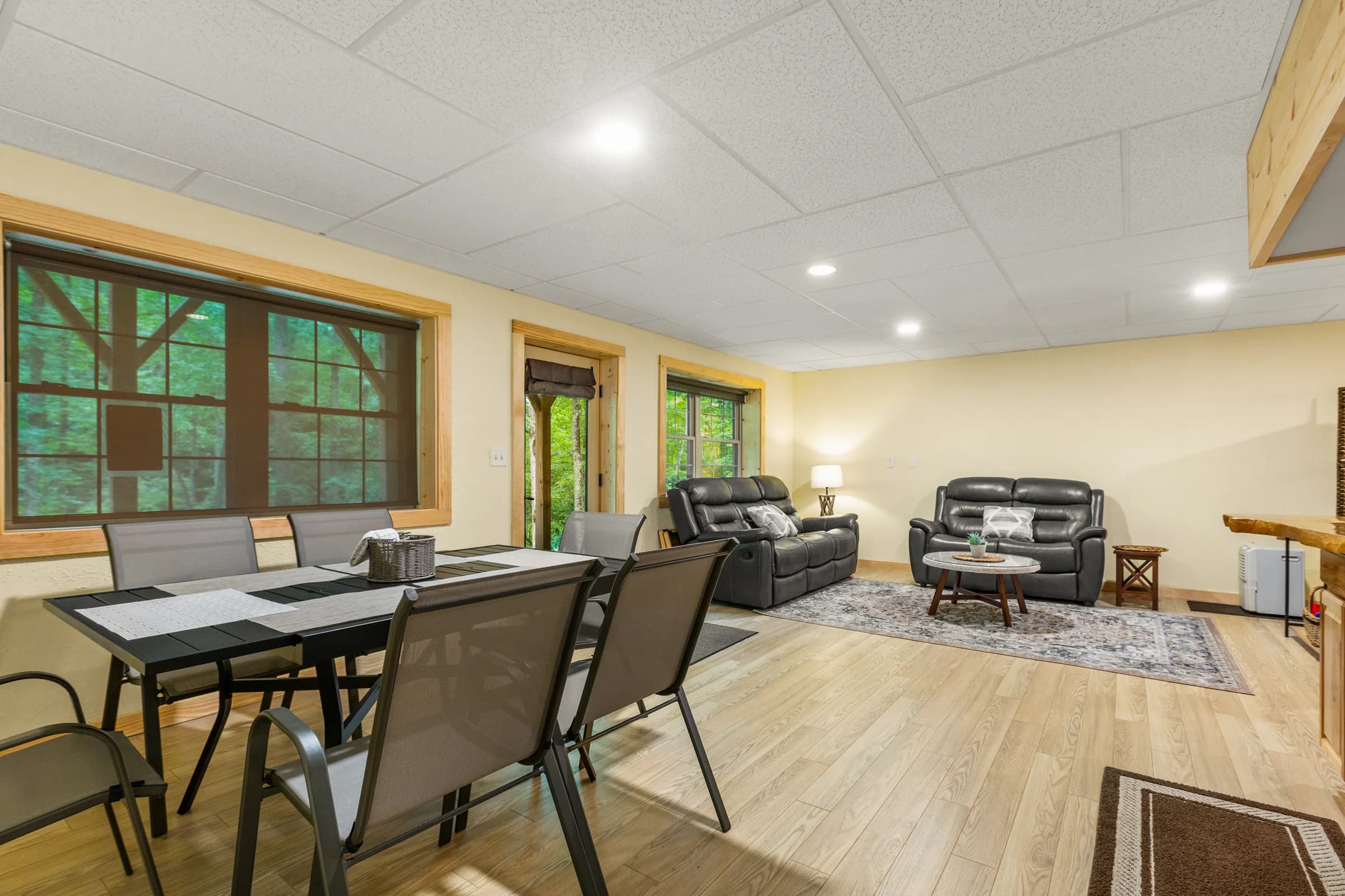 Whispering Trees Cabin lower-level lounge and game area
