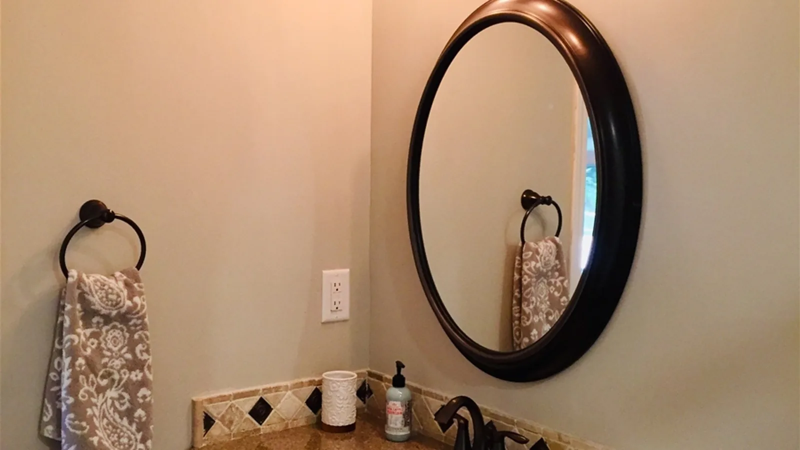 Whispering Trees Loft bathroom vanity and mirror