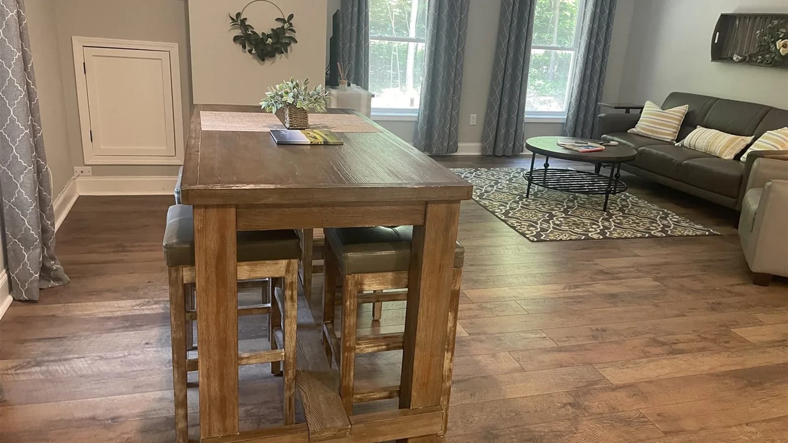Whispering Trees Loft dining table and open living area